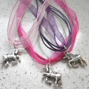 LOT OF 3 FUCHSIA/PINK/PURPLE UNICORN PENDANT RIBBON & CORD NECKLACES - Picture 1 of 2