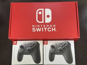Nintendo Switch Console w/ 2 Pro Controllers & 125GB SD Card - Picture 1 of 8