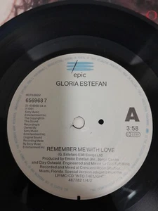 Gloria Estefan - Remember me with love/Your love is bad for me on Epic label. - Picture 1 of 3
