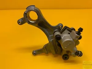 2006 KAWASAKI KX450F REAR BACK BRAKE CALIPER WITH HANGER - Picture 1 of 4