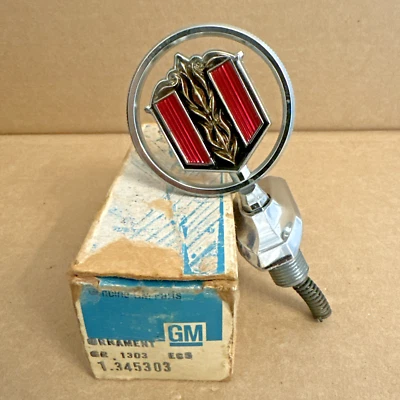 NOS 1974-77 Chevrolet Malibu Header Panel Hood Ornament Emblem - GM 345303 - Image 1 of 4