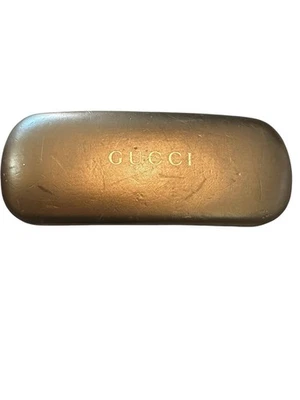 Estuche rígido dorado para gafas/gafas de sol Gucci con paño de limpieza Foto 1 de 4