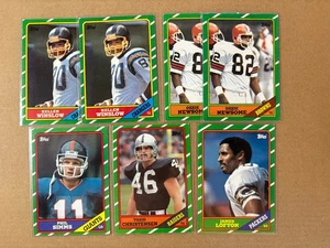(7) 1986 Topps Football Cards Winslow Simms Newsome Lofton Christensen - Bild 1 von 1