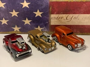 MUSCLE MACHINES 40 WILLYS GOLD, 56 FORD RED/BLACK & 40 FORD PANEL 1:64 SCALE - Picture 1 of 10