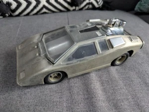 Vintage Lamborghini Countach Tischaschenbecher und Feuerzeug mit Spieluhr - Bild 1 von 13