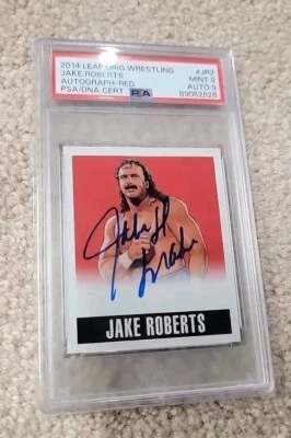 Tarjeta firmada por Jake Snake Roberts 2014 Leaf WWF automática #5/10 autógrafo rojo PSA 9 Foto 1 de 2