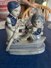 Blue and White and blue Porcelain chinese Boy and Girl in Row Boat Figurine