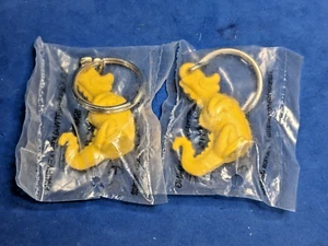 Keyring Keychain Douglas Dirtwalker yellow Dragon Dinosaur Figure Tupperware NIP - Picture 1 of 4
