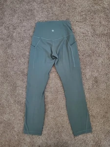 Lululemon Align hoch geschnittene Hose mit Taschen 22,5" grün Größe 2 - Bild 1 von 5