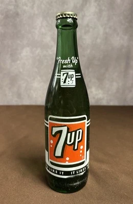 Botella de refresco 7UP 12 OZ Seven-Up “Te gusta… te gusta” 1956 tapada completa Foto 1 de 4