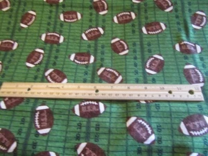 2 Yards Green With Brown Footballs and Yard Lines Flannel Fabric - Picture 1 of 1