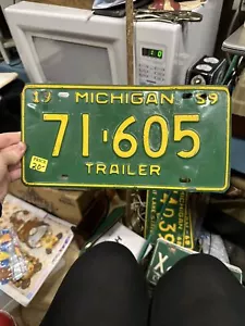 1959 Michigan Trailer License Plate 71-605 - Picture 1 of 19