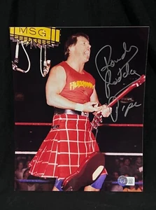 ROWDY RODDY PIPER KILT SIGNED AUTOGRAPH WWF WRESTLING 8x10 PHOTO BECKETT BAS COA - Picture 1 of 3