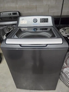 GE top load washer and dryer combination. Lightly used. - Picture 1 of 12