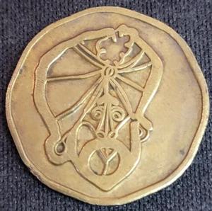 ALADDIN'S CASTLE - 8 SIDED ARCADE TOKEN - GENIE/CASTLE - Picture 1 of 2