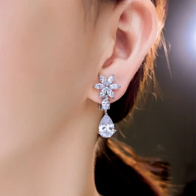 Pendientes de clip colgantes con flor de circón cúbico enchapados en plata para mujer boda Foto 1 de 4