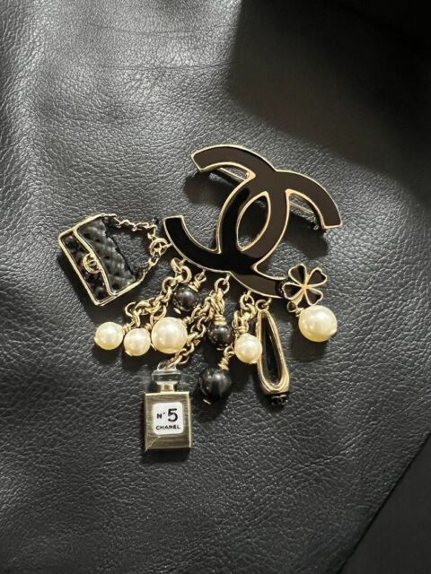 black chanel pin
