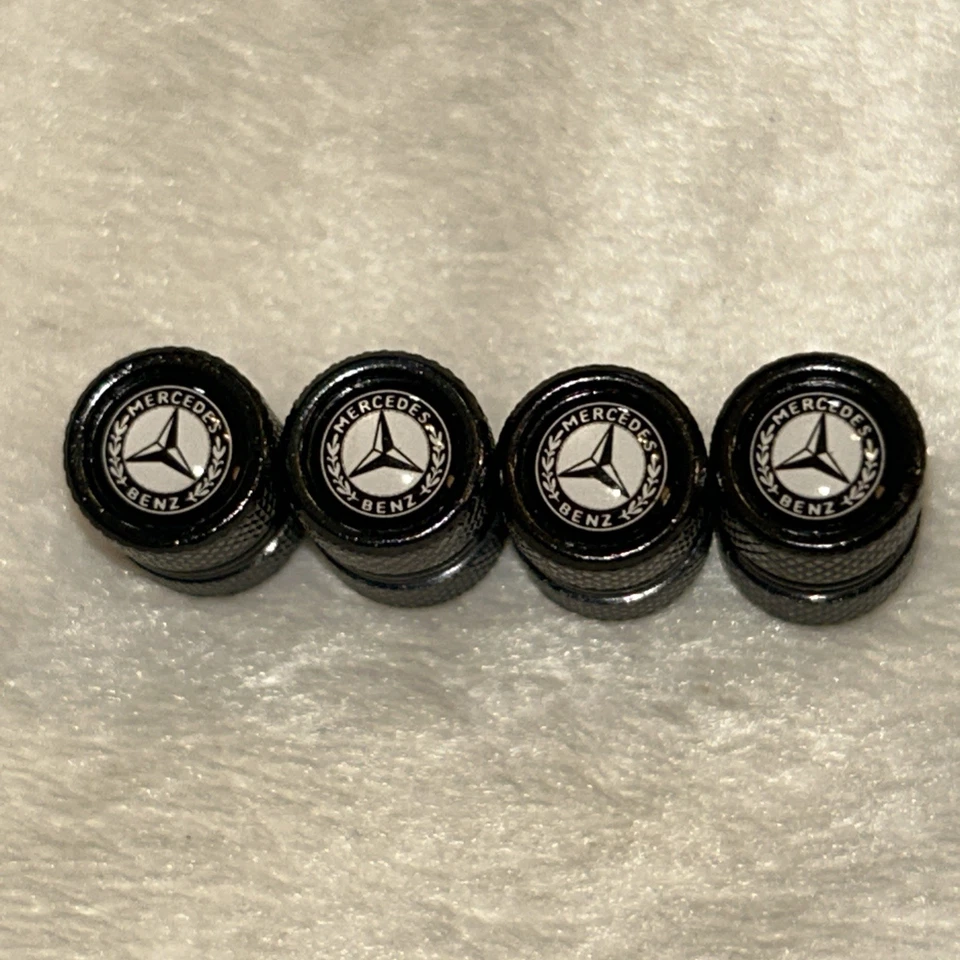 Juego de 4 tapas de vástago de válvula negras Mercedes Benz (estilo 4) Foto 1 de 3