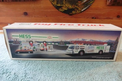 Banco de camión de bomberos de juguete Hess 1989 vintage - escalera roja, luces y sirena nuevo en caja Foto 1 de 4