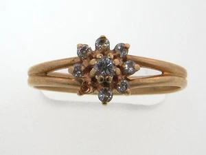 Damen Cluster Ring mit 8 Diamanten (1 Diamant fehlt) - Band aus 14 Karat Gold - Bild 1 von 3