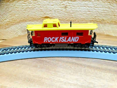 TYCO HO Scale 33' Weighted Rock Island Cupula Caboose - Image 1 of 4