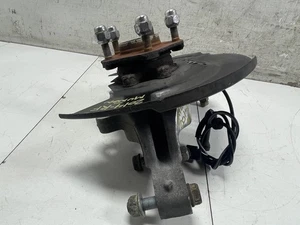 Nissan Pathfinder 2014 eje del lado del pasajero delantero derecho nudillo cubo de rueda - Imagen 1 de 12