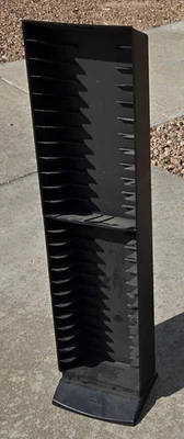 Torre de cinta vintage Laserline 24 VHS estante de almacenamiento plástico negro soporte 2 piezas Foto 1 de 3