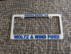 RARE Woltz & Wind Heidelberg Pennsylvania Ford Plastic License Plate Frame - Picture 1 of 2