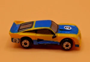 Vintage Micro Machines 1989 Galoob Blue Yellow Race Car - Picture 1 of 5