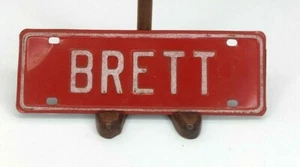 Vtg Bicycle License Plate Red Metal White Letters BRETT Faded - Picture 1 of 4
