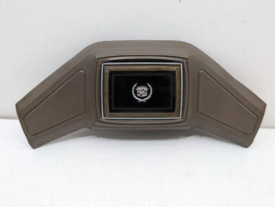 Cadillac Deville Seville Fleetwood años 80—Almohadilla de bocina central para volante Foto 1 de 4