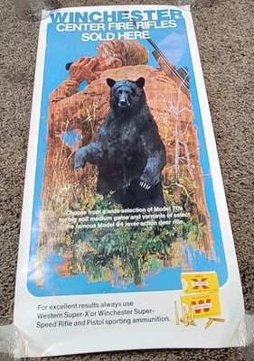 Cartel publicitario Winchester Center Fire Rifles vendido aquí modelo 70 modelo 94  Foto 1 de 4