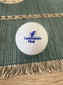 Community First Logo Golf Ball Titleist 1 DT 2 Piece Ready For Next Round Of Fun - Picture 1 of 3