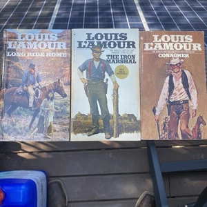 Lot Of 3VG PB,s Louis L'Amour Including Iron Marshal , Conagher ,Long Ride Home - Picture 1 of 3