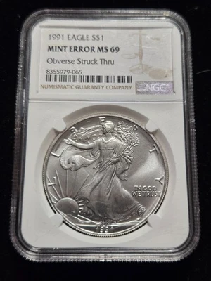 1991 Silver Eagle NGC MS69 MINT ERROR Obverse Struck Thru (Z-1132) - Image 1 of 3