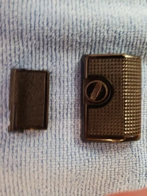 Canon A-1 Battery door (New) and Canon A-1 AE-1 Finger Grip used - Image 1 of 4