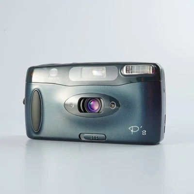 EXCELENTE CÂMERA DE FILME MINOLTA P's Panorama 24mm F/4.5 Point & Shoot - Imagem 1 de 4