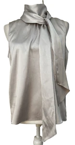 Blusa DKNY para mujer satinada sin mangas cuello alto lazo trasero plateada talla pequeña - Imagen 1 de 7
