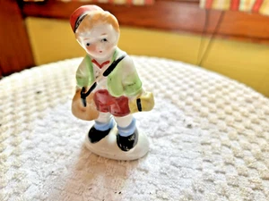 Vintage Figurines made in OCCUPIED JAPAN Scotland Boy ? Holding  Bag - Picture 1 of 4