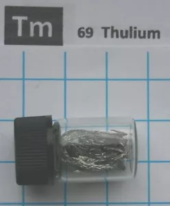 1 gram 99.9% Thulium metal pieces in glass vial element 69 sample - Picture 1 of 3
