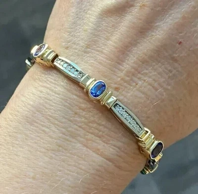 Brazalete de tenis para mujer enchapado en oro amarillo de 14 quilates con zafiro de corte ovalado de 5 quilates creado en laboratorio Foto 1 de 4