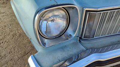 Cutlass Supreme 1975 pasajero luz de cabeza derecha OEM lámpara delantera cupé de 2 puertas Foto 1 de 4
