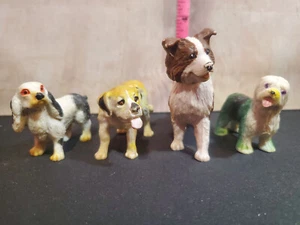 4 figuras de perro de plástico - Imagen 1 de 9