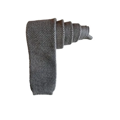 Corbata vintage Paco Rabanne gris lana texturizada fondo plano  Foto 1 de 4