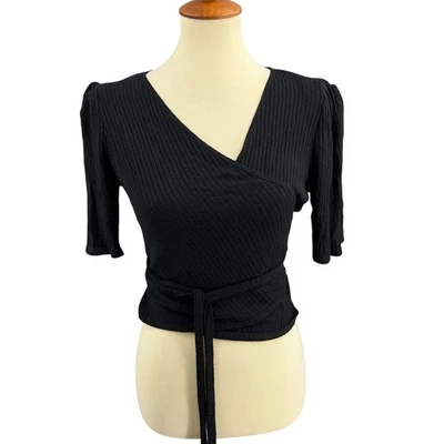 Pantalones de mezclilla Reformation negros acanalados envolventes manga abullonada lazo cintura talla XL Foto 1 de 4