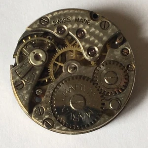 Marvin 310 watch movement for spares or repairs. Balance swings, Needs Service. - Picture 1 of 7