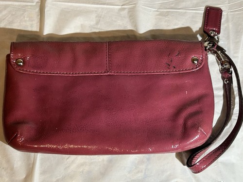Borsa pochette da polso Coach prugna in pelle color bordeaux