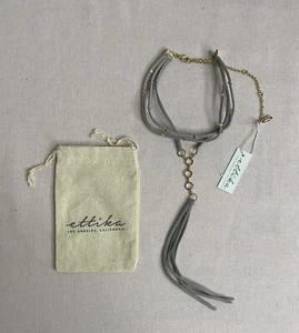 Neu mit Etikett - Ettika - Kunstleder goldfarben verstellbar Halsreif Halskette. Grau - Bild 1 von 4