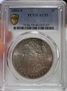 Dólar de plata Morgan 1884 S graduación profesional ¡Escudo de oro AU-55! - Imagen 1 de 2