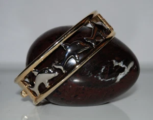 PULSERA CON BISAGRAS ELEGANTE DISEÑO DE DELFÍN DORADO Y PLATEADO DE ALTA COSTURA - Imagen 1 de 12